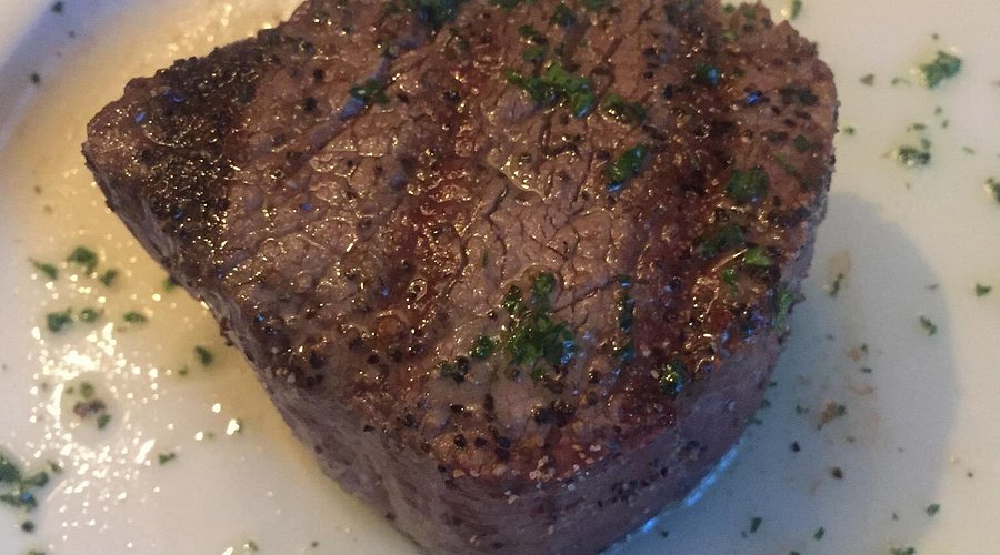 Folk’s Folly signature dishes Filet Mignon, Fried Dill Pickles, She-Crab Soup, Calamari, Maker's Mark Medallions